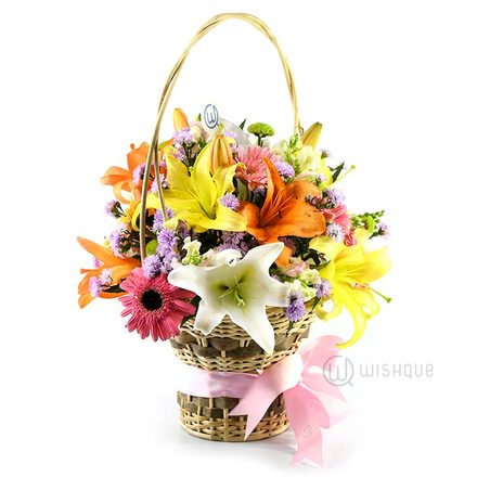 Flowers in a Rainbow Lily Bucket