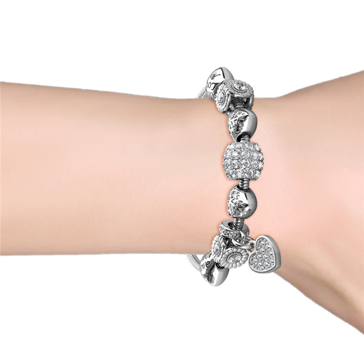 Stone Studded Charm Bracelet With Swarovski Crystals White-Gold Plated