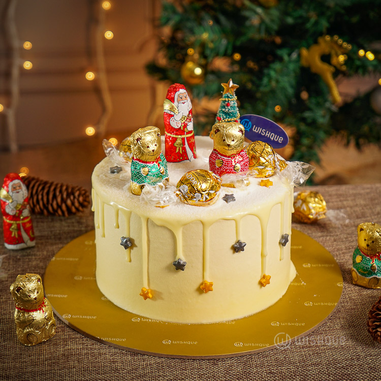 Lindt Gold Winter Wonderland White Chocolate Drip Ribbon Cake