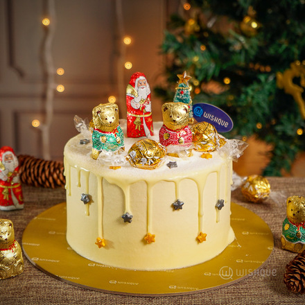 Lindt Gold Winter Wonderland White Chocolate Drip Ribbon Cake